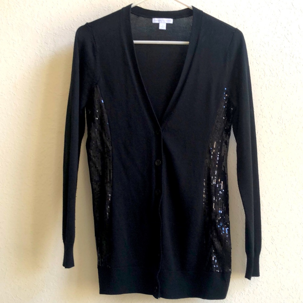 Women’s long sleeve button down cardigan with sequins on the sides. Size Small